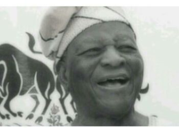 Man Laughing Wearing A Cap